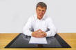 © travelview - business man sitting at his desk