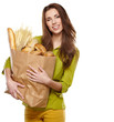 Smiling woman holding a grocery bag