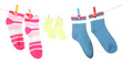 © Africa Studio - Colorful socks hanging on clothesline, isolated on white
