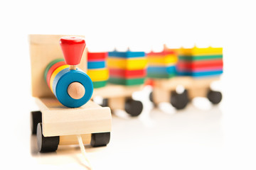 wooden educational toys. colorful train isolated