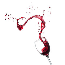 Red Wine Splashing From Glass, Isolated On White Background
