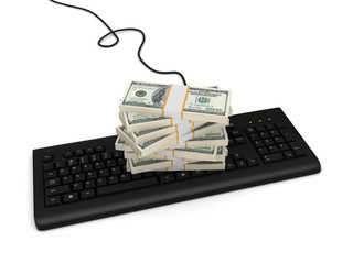 Canvas Print - Stack of dollars on a keyboard.