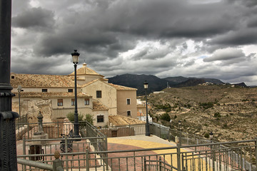 small town under storm clouds