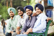 Young adult indian sikh men