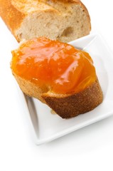 Toast with apricot jam.