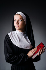 Young nun in religious concept