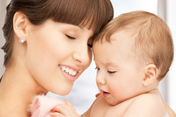 happy mother with adorable baby