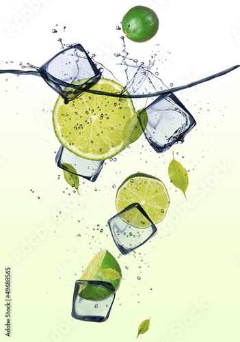 Fototapeta na wymiar Limes with ice cubes