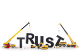 Fototapeta Desenie - Build up trust: Machines building trust-word.