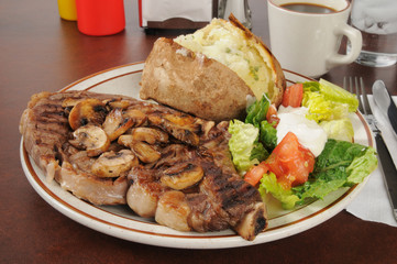 Wall Mural - Steak with a baked potato