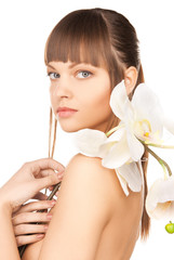 Wall Mural - lovely woman with orchid flower