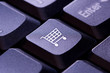 Shopping cart icon on a computer keyboard key