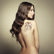 Portrait Nude Young Woman With Tattoo
