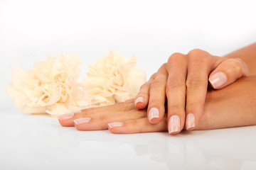 Sticker - Woman in a nail salon receiving a manicure