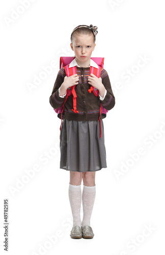 Frowning pupil is ready to go to school, isolated Poster