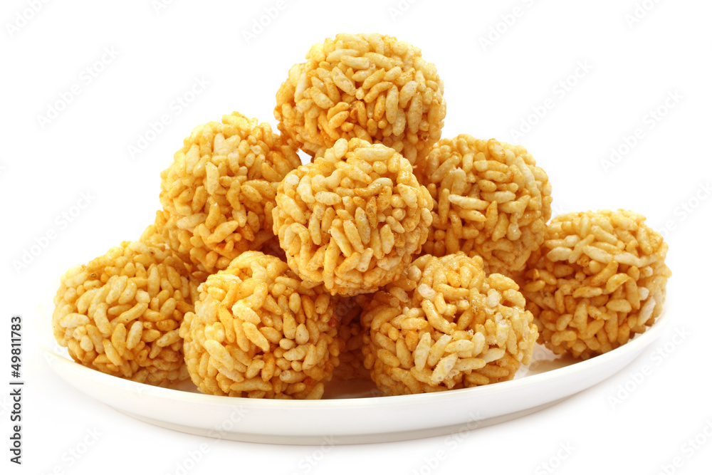 Tuffed Rice Ball Puffed rice balls with molasses Stock Photo | Adobe Stock