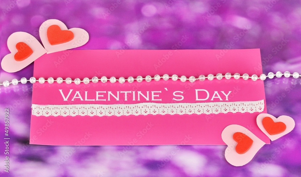 Greeting card for Valentine's Day on purple background
