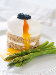 Canvas Print - Bread with poached egg with asparagus