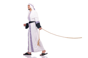 Wall Mural - Arab man in tug of war concept