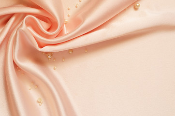 Satin drapery with pearls