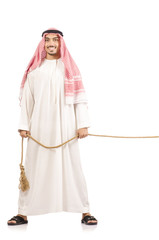 Wall Mural - Arab man in tug of war concept