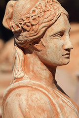 Wall Mural - classic terracotta sculpture with female  profile, Tuscany