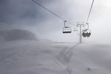 Ski Chairlift On Foggy Day