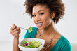© Rido - African American Woman Eating Salad