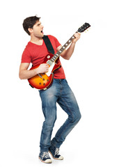 Wall Mural - Young guitarist plays on the electric guitar