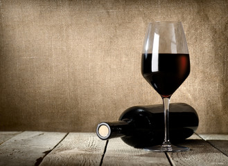 Wall Mural - Black bottle and red wine