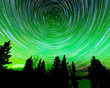 © PiLensPhoto - Star trails around Polaris and Northern lights
