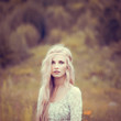 © VectorART - beautiful girl in a field in spring