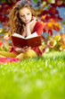 beautiful girl with book in the spring  park