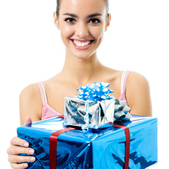 Young smiling woman with gift, isolated