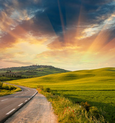 Wall Mural - Wonderful fields with springtime sunset colors