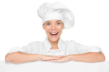 Wall Mural - Chef or baker woman showing sign billboard excited