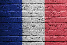 Brick Wall With A Painting Of A Flag, France