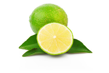 Wall Mural - Fresh lime with green leaves isolated on white background