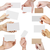 Fototapeta  - Collection of blank cards in a hand isolated on white