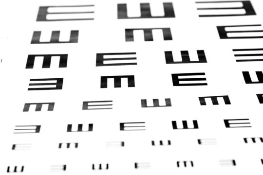 Eyesight test chart on white background close-up
