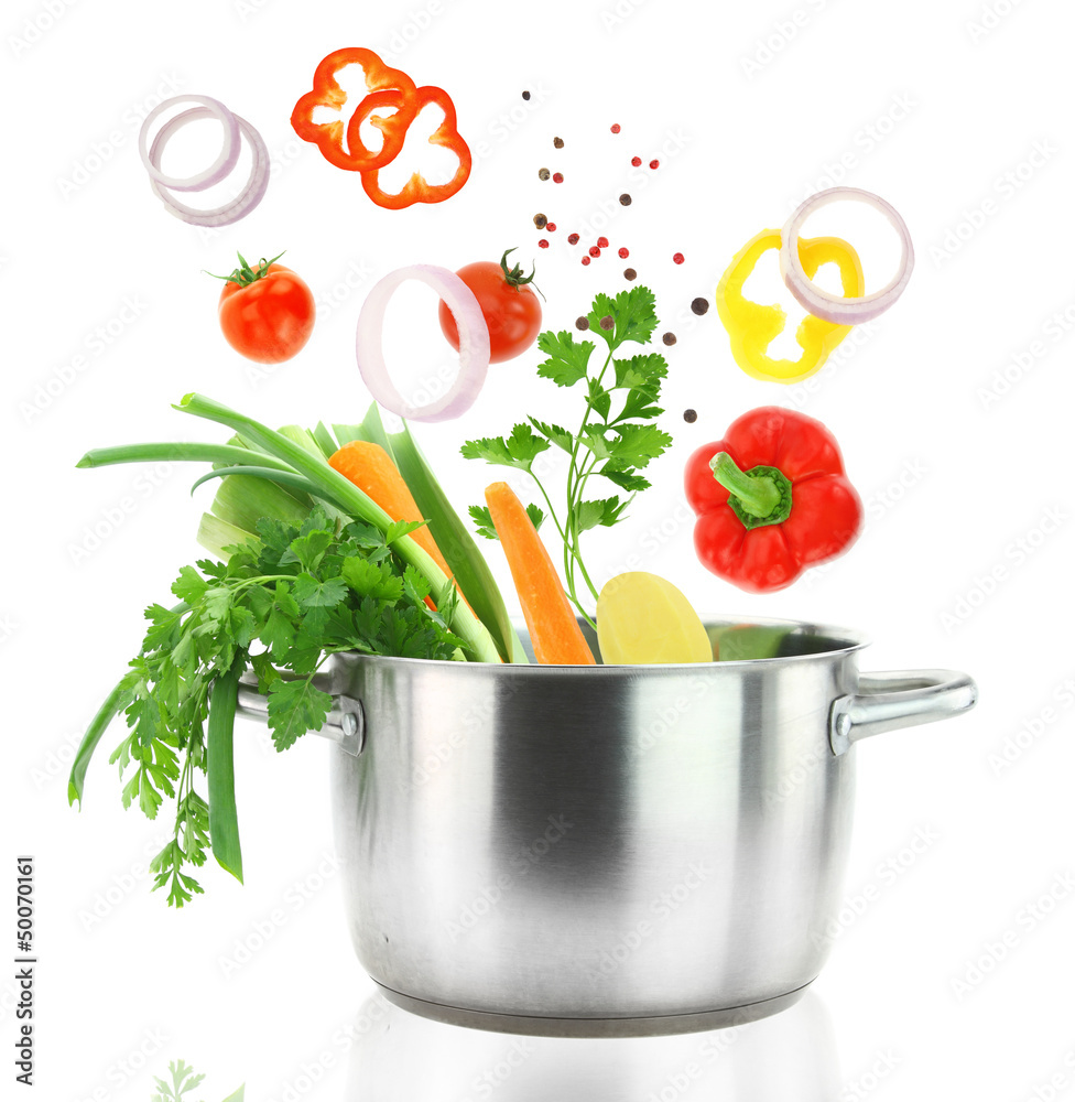 Fresh vegetables falling into a stainless steel casserole pot - obrazy, fototapety, plakaty 