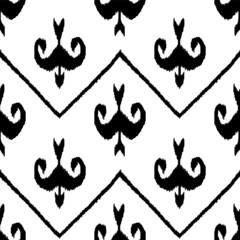 Wall Mural - Traditional ikatseamless pattern in black and white, vector