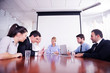 © .shock - business people in a meeting at office