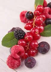 Canvas Print - berries fruits on wood