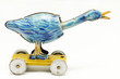 old tin toy blue duck with wheels and swivel neck