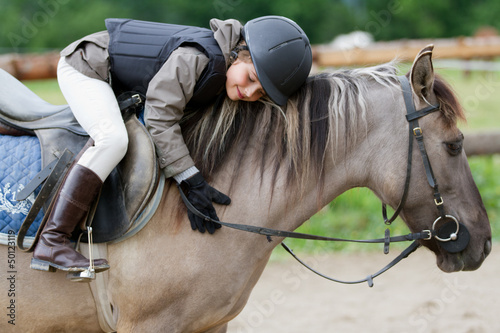 Cuadros en Lienzo Horse riding - lovely equestrian on a horse