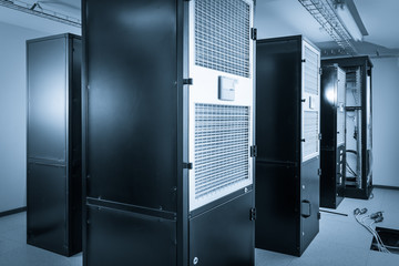 server cabinets inside data center room