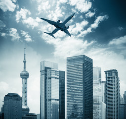 Wall Mural - modern building with airplane