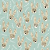 Wielkanocne króliki i rośliny deseń na niebieskim tle