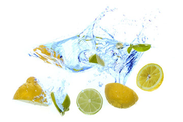 Wall Mural - fresh lemons splash into water